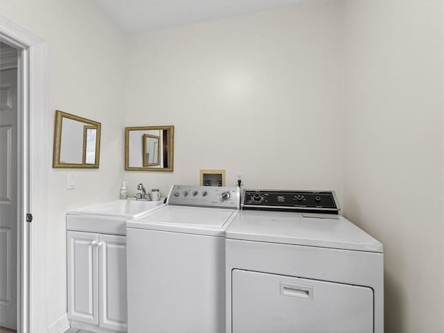 1010 Plank Rd, Penfield, NY 14580 - laundry room featuring washer and dryer and cabinet space