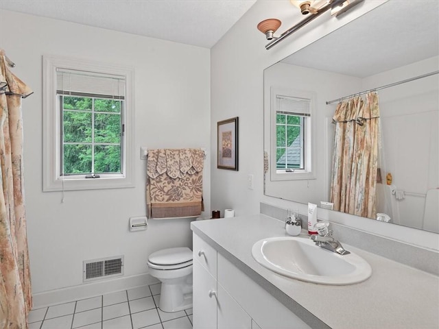 1010 Plank Rd, Penfield, NY 14580 - bathroom with healthy amount of natural light, vanity, tile patterned flooring, and a shower with shower curtain