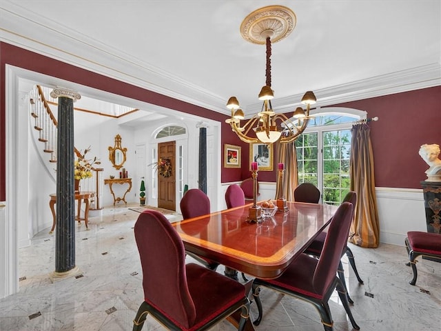 1010 Plank Rd, Penfield, NY 14580 - dining area with a chandelier, ornamental molding, light marble finish flooring, wainscoting, and stairs