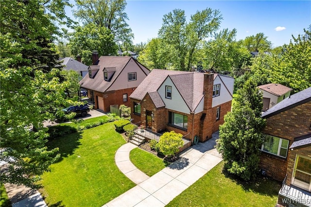 124 Allenhurst Rd, Amherst, NY 14226 - english style home featuring brick siding and a front yard