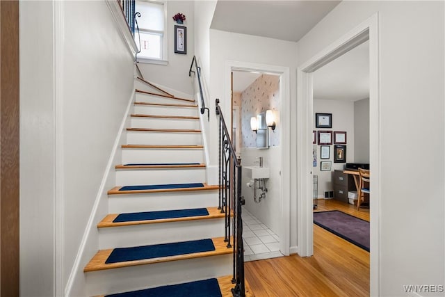 124 Allenhurst Rd, Amherst, NY 14226 - stairs with wood finished floors and baseboards