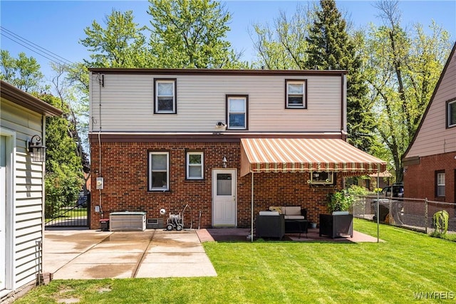 124 Allenhurst Rd, Amherst, NY 14226 - back of property featuring a patio area, an outdoor living space, and brick siding