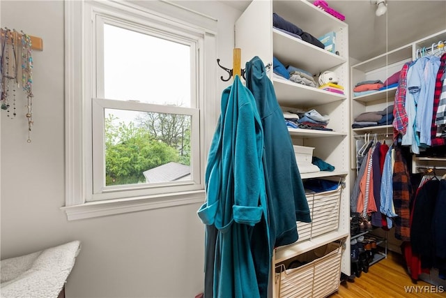 124 Allenhurst Rd, Amherst, NY 14226 - walk in closet featuring wood finished floors