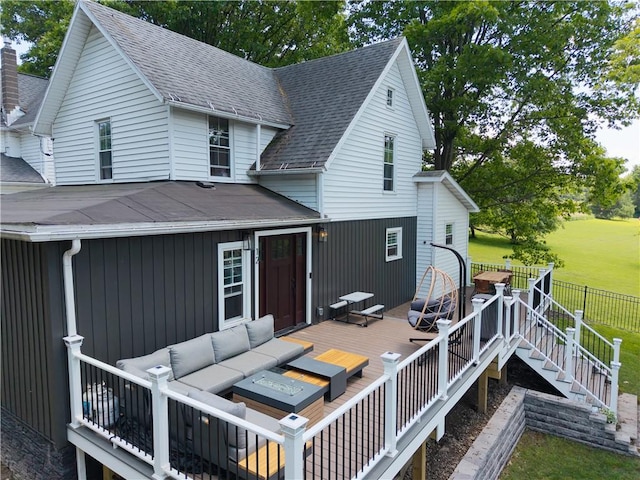 7046 Safford Ave Unit 12, Castile, NY 14530 - deck with an outdoor living space with a fire pit