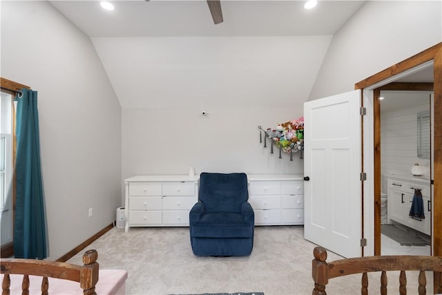 7046 Safford Ave Unit 12, Castile, NY 14530 - bedroom with vaulted ceiling, light colored carpet, recessed lighting, and connected bathroom