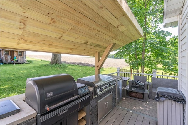 7046 Safford Ave Unit 12, Castile, NY 14530 - deck featuring a grill and a lawn