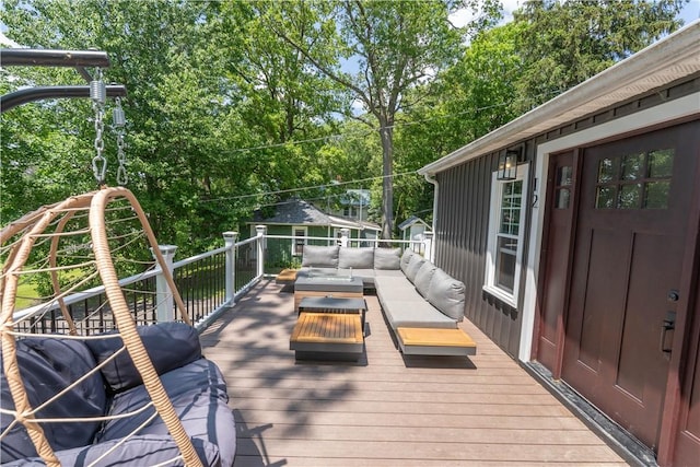 7046 Safford Ave Unit 12, Castile, NY 14530 - deck with an outdoor hangout area and view of wooded area