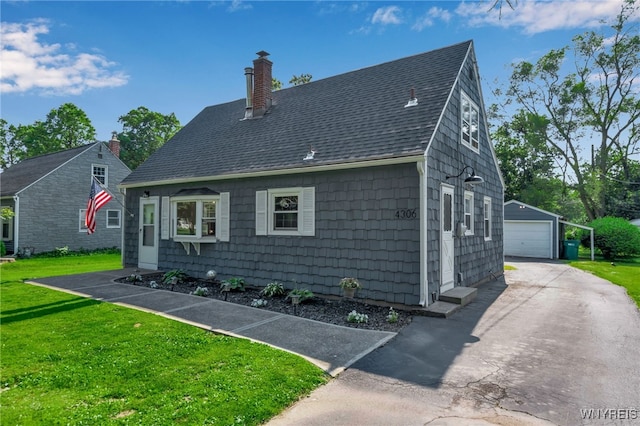 4306 Shimerville Rd, Clarence, NY 14031 - view of front of property featuring an outdoor structure, a detached garage, roof with shingles, a chimney, and a front lawn