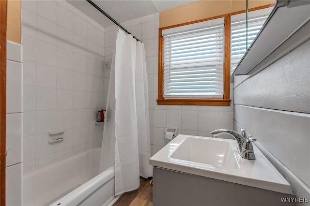 4306 Shimerville Rd, Clarence, NY 14031 - full bath with shower / bath combination with curtain, vanity, wood finished floors, and tile walls
