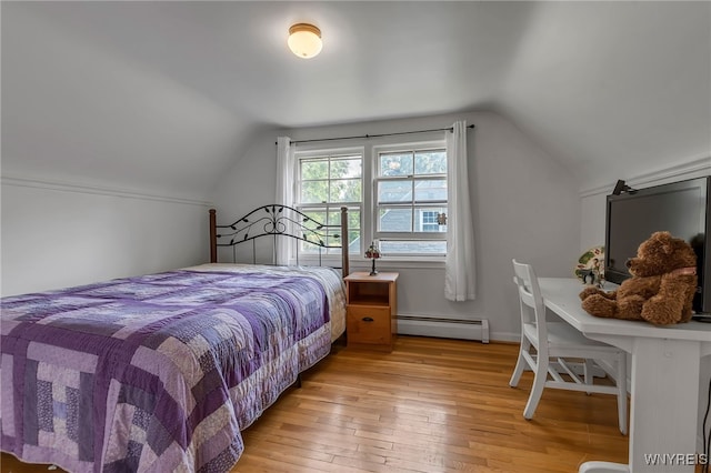 4306 Shimerville Rd, Clarence, NY 14031 - bedroom with a baseboard heating unit, lofted ceiling, and light wood-type flooring
