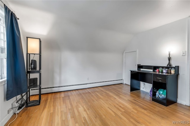 4306 Shimerville Rd, Clarence, NY 14031 - unfurnished office featuring baseboard heating, light wood-type flooring, and lofted ceiling