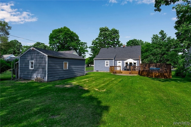 4306 Shimerville Rd, Clarence, NY 14031 - rear view of property with a wooden deck, a yard, and an outdoor structure