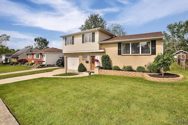 48 Kibler Dr, Lancaster, NY 14043 - tri-level home with brick siding, concrete driveway, a garage, and a front yard