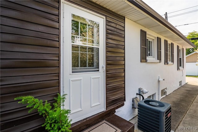 482 Loretta St, Tonawanda-Town, NY 14223 - view of exterior entry with stucco siding
