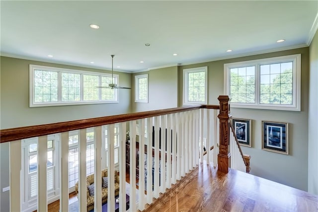 393 Mendon Center Rd, Mendon, NY 14472 - hallway featuring an upstairs landing, ornamental molding, plenty of natural light, recessed lighting, and wood finished floors