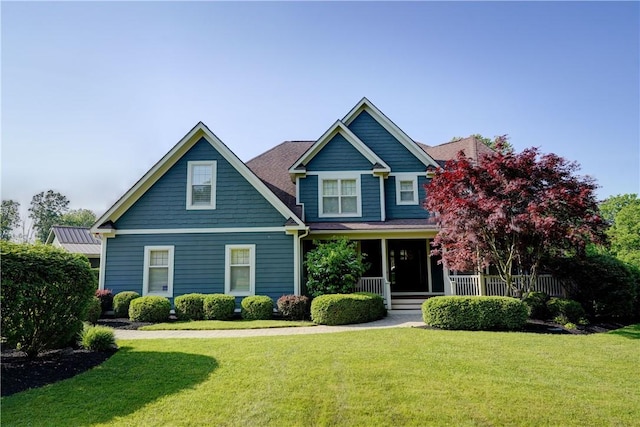 393 Mendon Center Rd, Mendon, NY 14472 - craftsman house with a front yard and covered porch
