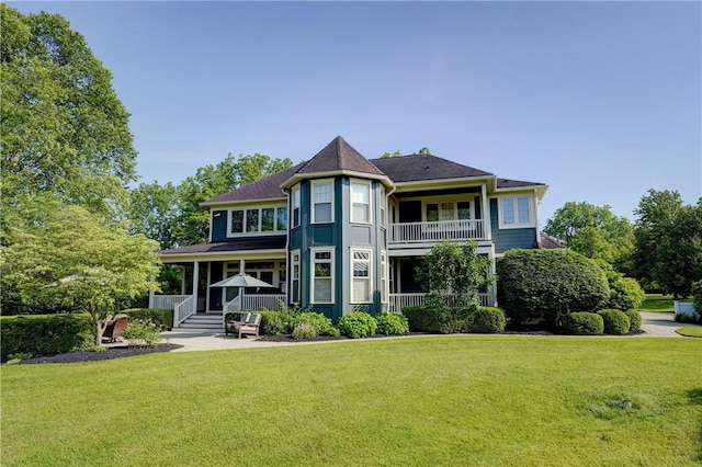 393 Mendon Center Rd, Mendon, NY 14472 - rear view of property with a lawn and a balcony
