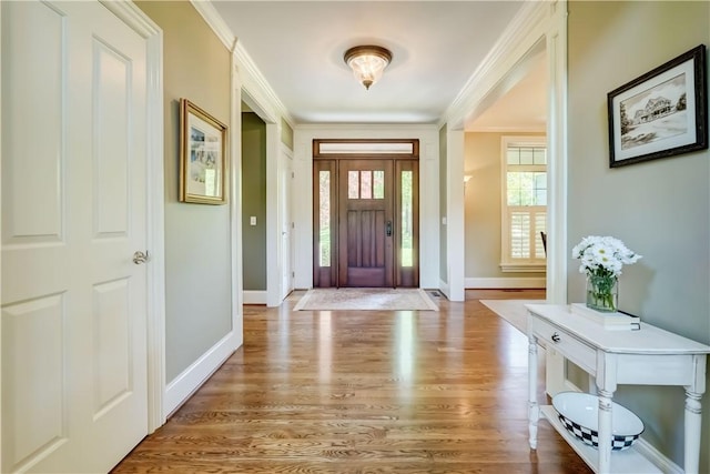 393 Mendon Center Rd, Mendon, NY 14472 - entrance foyer with ornamental molding and wood finished floors