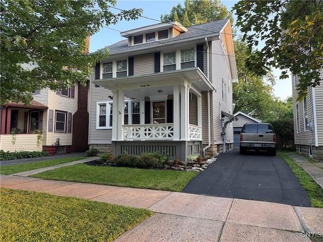 24 Van Vorst St, Utica, NY 13501 - traditional style home with covered porch, a front lawn, and a shingled roof