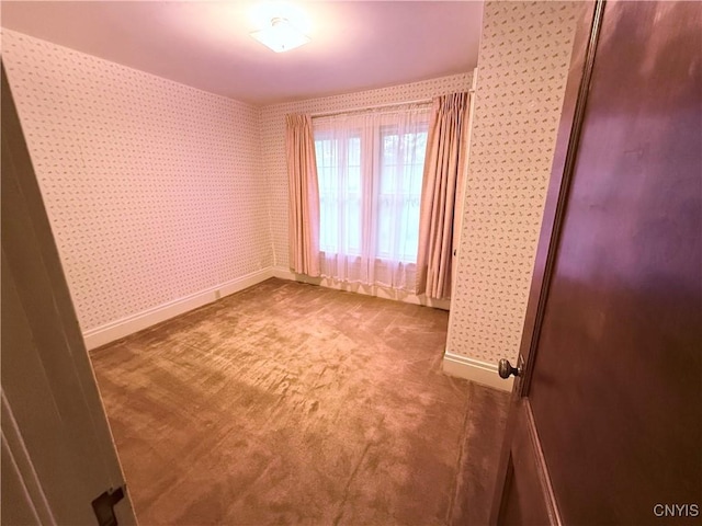 24 Van Vorst St, Utica, NY 13501 - carpeted empty room with wallpapered walls