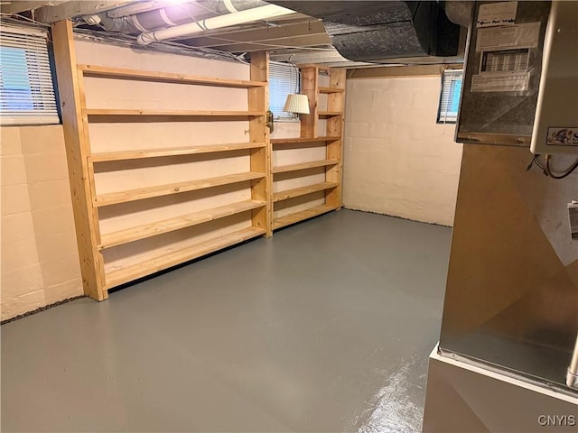 24 Van Vorst St, Utica, NY 13501 - unfinished below grade area with heating unit and concrete block wall