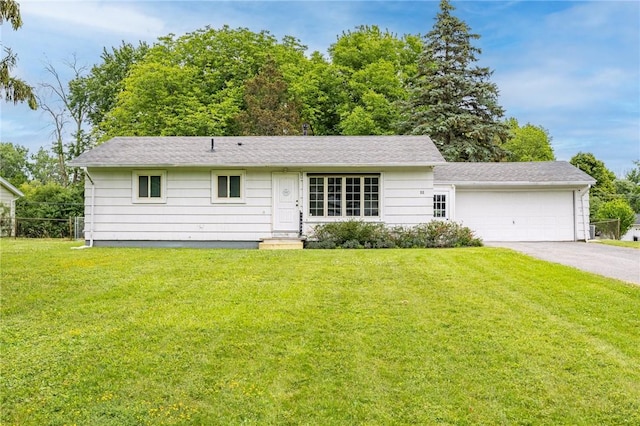 88 Rouge Rd, Henrietta, NY 14623 - view of front of house with a front yard, asphalt driveway, a garage, and entry steps