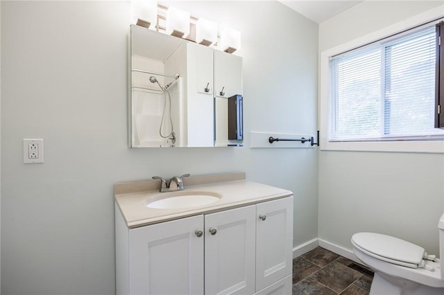 88 Rouge Rd, Henrietta, NY 14623 - full bath featuring vanity, stone finish flooring, and a shower