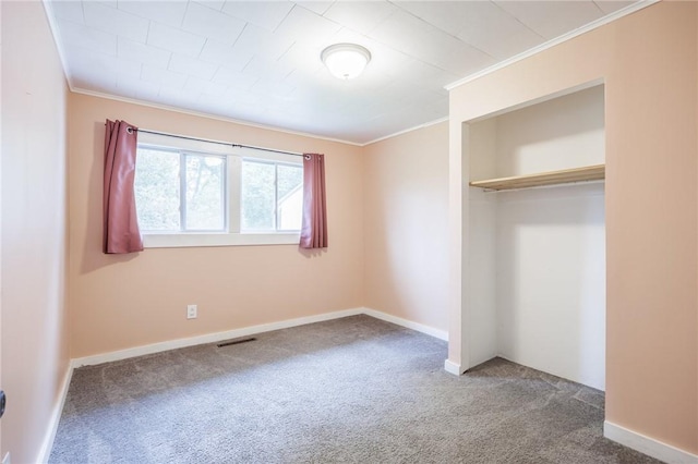88 Rouge Rd, Henrietta, NY 14623 - unfurnished bedroom with ornamental molding, carpet flooring, and a closet