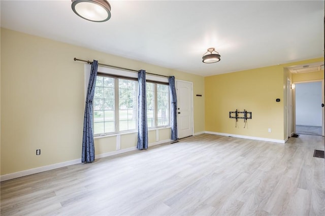 88 Rouge Rd, Henrietta, NY 14623 - spare room featuring light wood-style flooring and baseboards