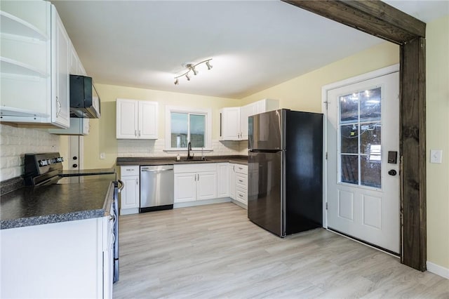 88 Rouge Rd, Henrietta, NY 14623 - kitchen featuring stainless steel appliances, dark countertops, white cabinetry, tasteful backsplash, and light wood finished floors