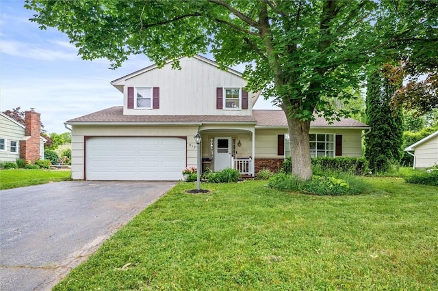 217 Red Lion Rd, Henrietta, NY 14467 - traditional home featuring driveway, a front yard, and a garage