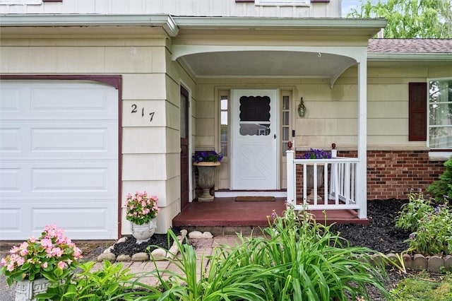217 Red Lion Rd, Henrietta, NY 14467 - doorway to property featuring roof with shingles and a garage