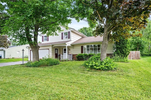 217 Red Lion Rd, Henrietta, NY 14467 - traditional-style home featuring an attached garage and driveway