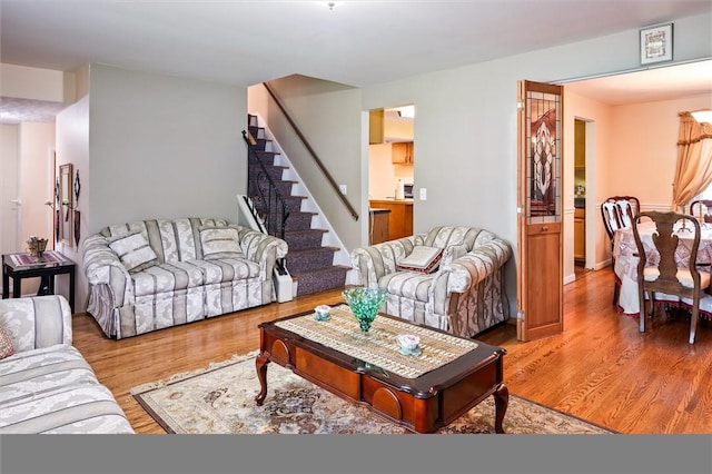 217 Red Lion Rd, Henrietta, NY 14467 - living room featuring wood finished floors and stairway