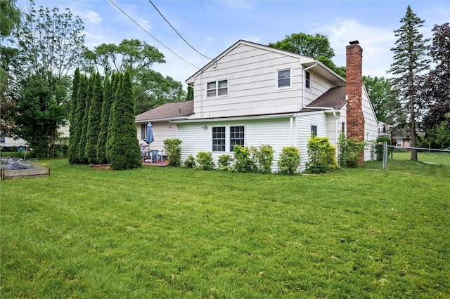 217 Red Lion Rd, Henrietta, NY 14467 - back of property featuring a chimney