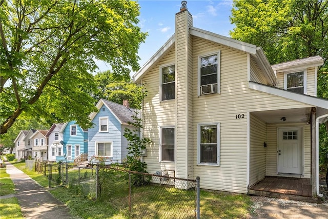 102 Cottage St, Rochester, NY 14608 - view of front facade with a chimney
