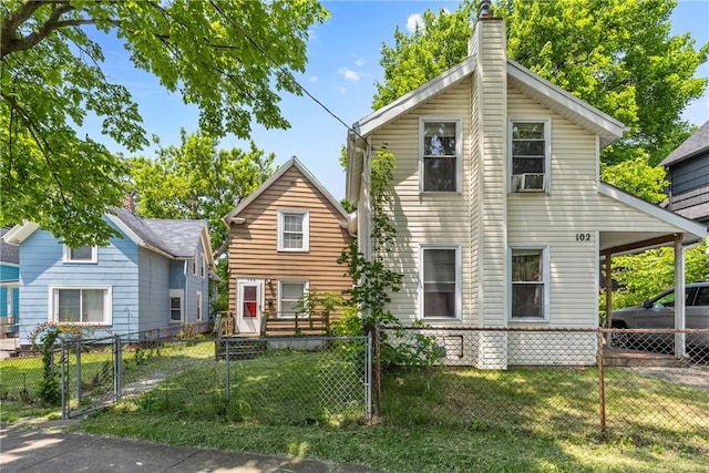 102 Cottage St, Rochester, NY 14608 - view of front of property with a chimney, a gate, and cooling unit