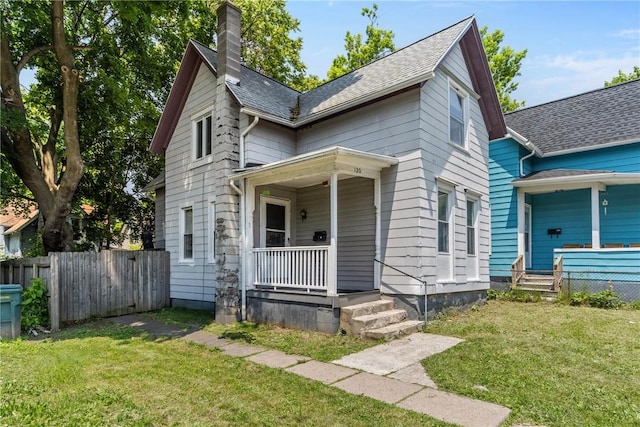 120 Cottage St, Rochester, NY 14608 - view of front of home with covered porch and a chimney