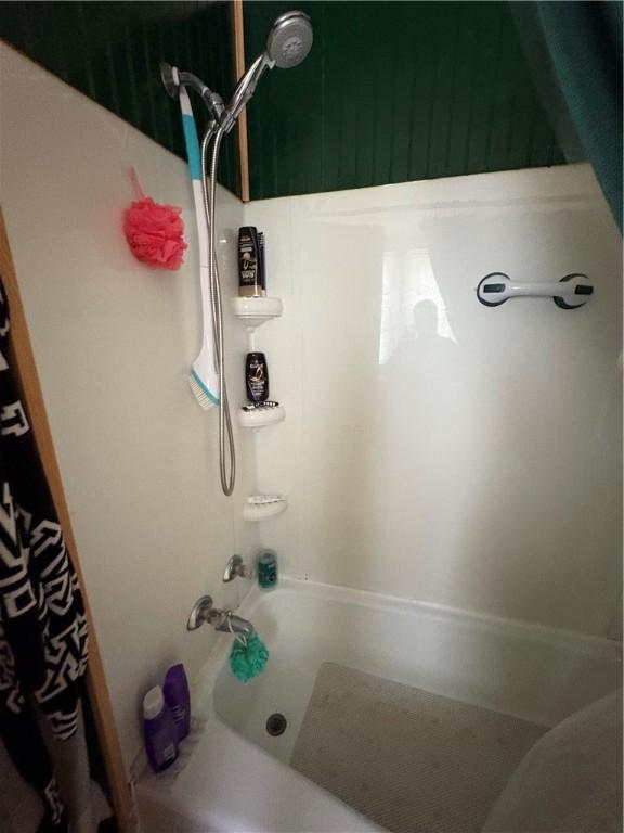 839 State Highway 7, Unadilla, NY 13849 - bathroom with shower / tub combo with curtain