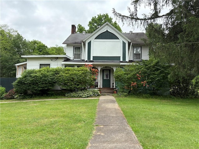 839 State Highway 7, Unadilla, NY 13849 - view of front of house with a front lawn and a chimney