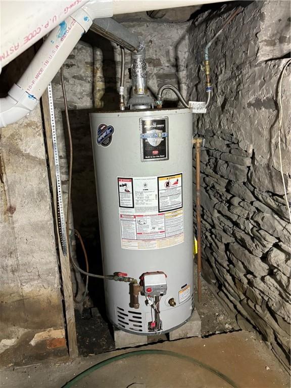 839 State Highway 7, Unadilla, NY 13849 - utility room featuring gas water heater