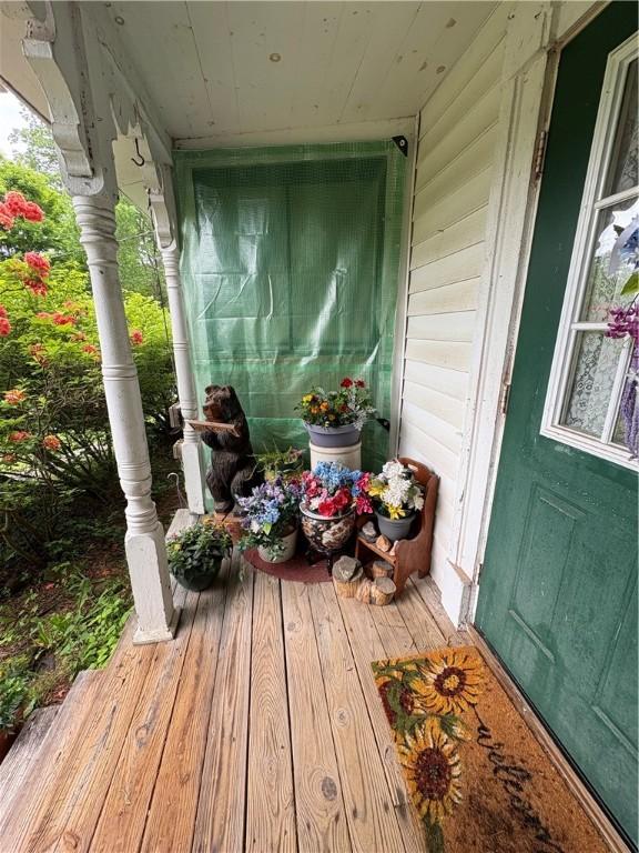 839 State Highway 7, Unadilla, NY 13849 - view of wooden porch