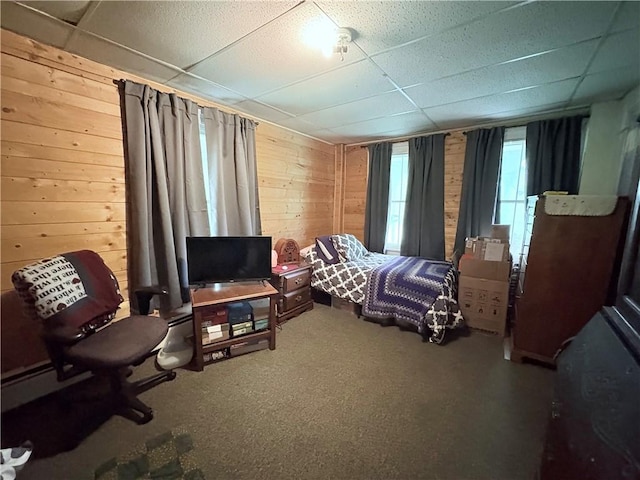 839 State Highway 7, Unadilla, NY 13849 - carpeted bedroom with a drop ceiling and wood walls