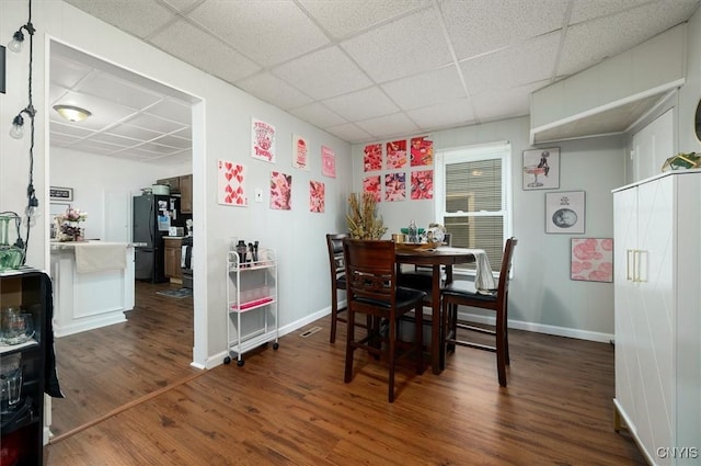 16 Meadow St, Kirkland, NY 13323 - dining room with dark wood finished floors and a drop ceiling