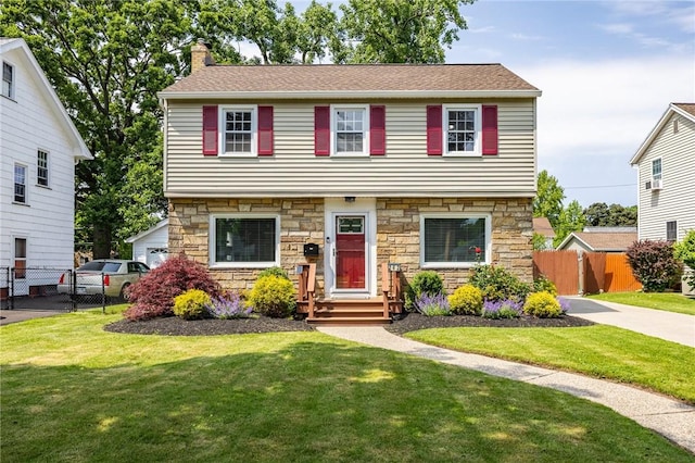262 Barry Rd, Irondequoit, NY 14617 - view of front of home featuring stone siding and a chimney
