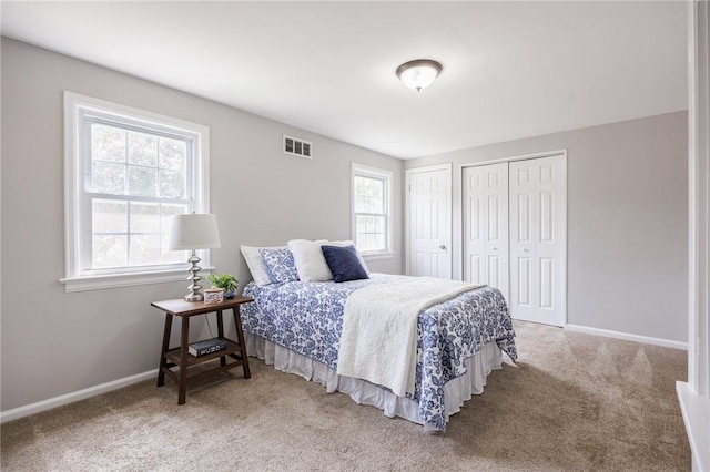 262 Barry Rd, Irondequoit, NY 14617 - carpeted bedroom with multiple closets and baseboards