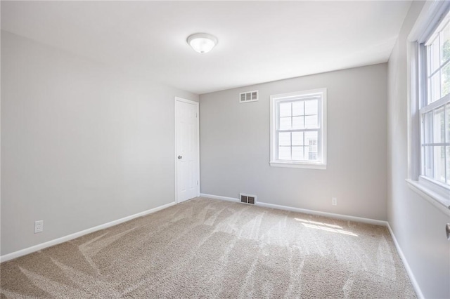 262 Barry Rd, Irondequoit, NY 14617 - carpeted empty room with plenty of natural light