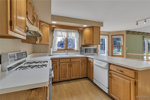 33 Sausalito Dr, Amherst, NY 14051 - kitchen with white appliances, under cabinet range hood, a peninsula, light countertops, and recessed lighting