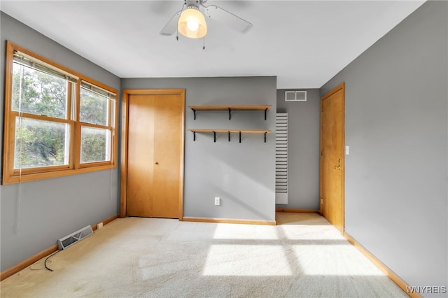 33 Sausalito Dr, Amherst, NY 14051 - unfurnished bedroom featuring light carpet and ceiling fan