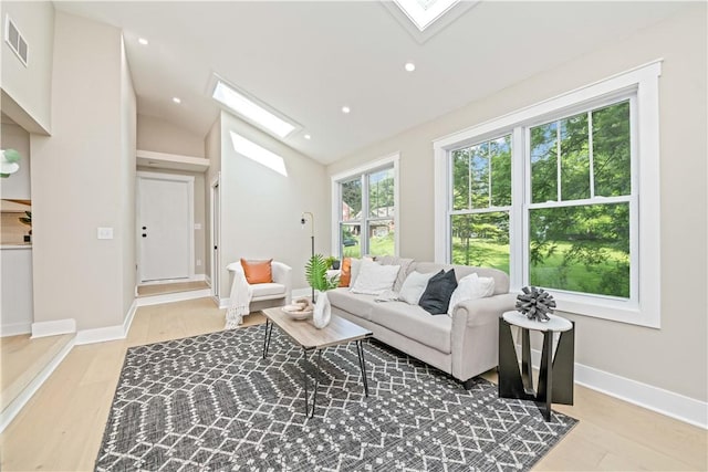 38 Richs Dugway Rd, Brighton, NY 14625 - living room featuring a skylight, wood finished floors, lofted ceiling, and recessed lighting